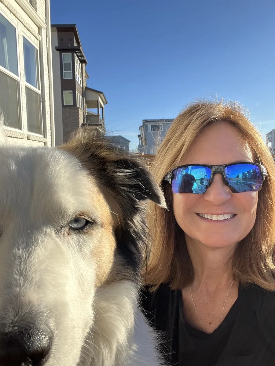 Jill and her dog Luna taking a sunny selfie together